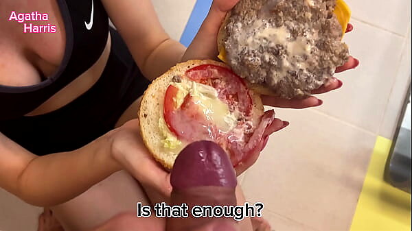 She devours a meaty burger
