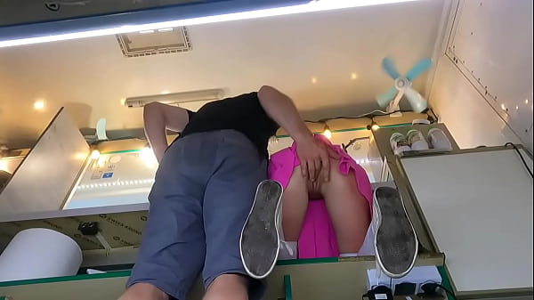 The boss is playing with his sexy shop assistant pussy while she talks to the customer